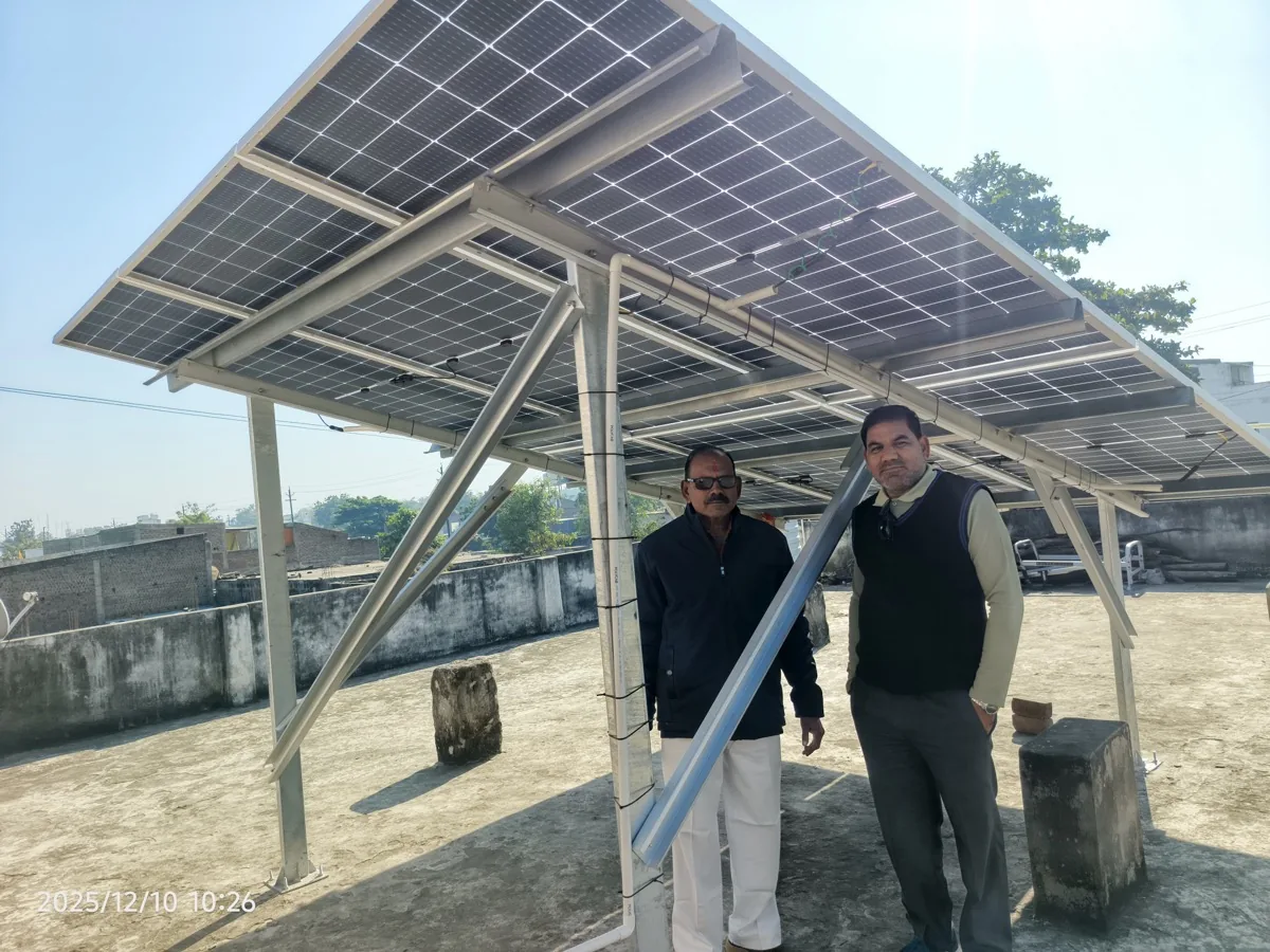 Completed rooftop system with homeowner, December 2025